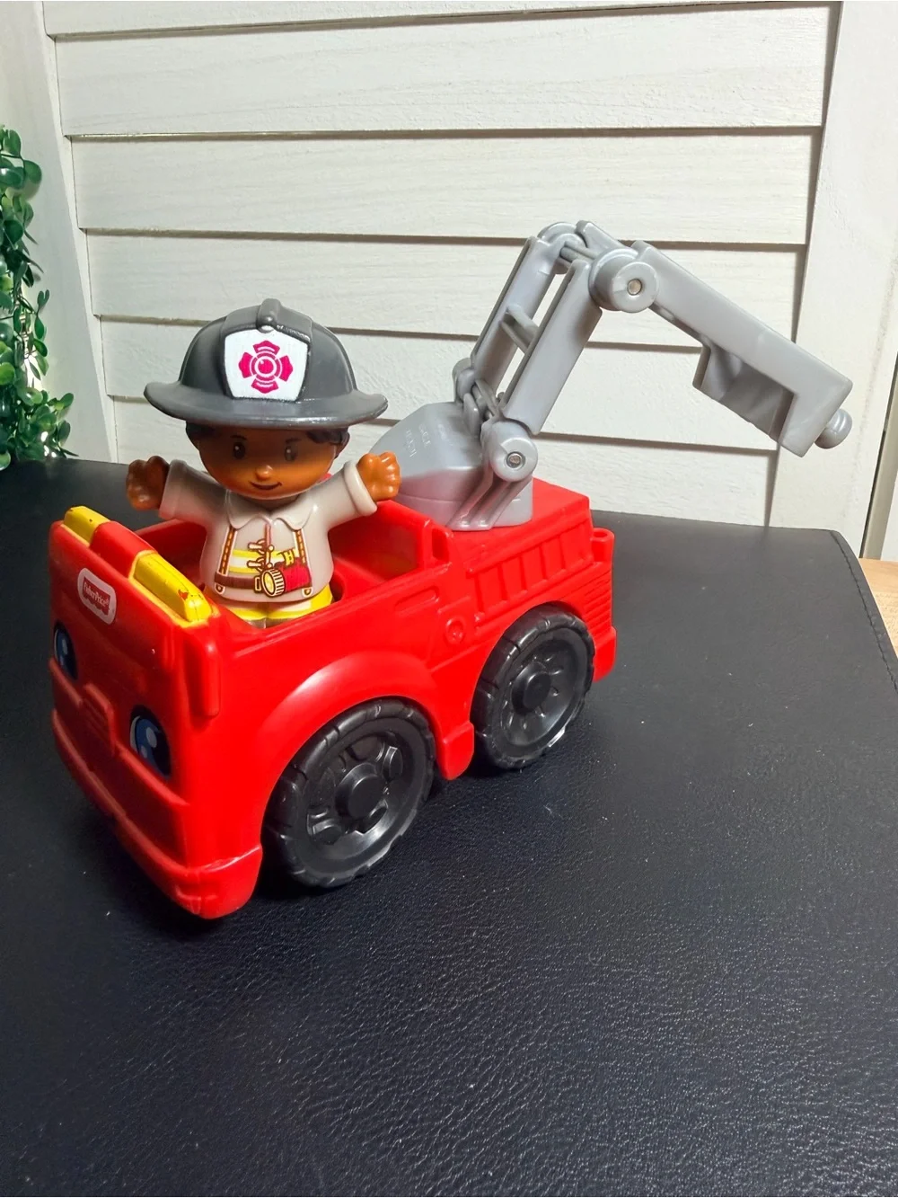Fisher-Price Little People Red Fire Rescue Truck with Black-Helmet Firefighter